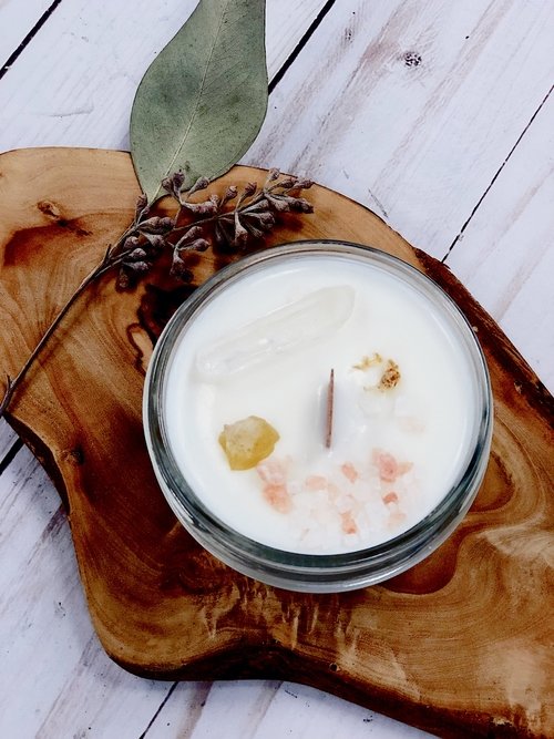 Organic space clearing candle with calming essential oils.